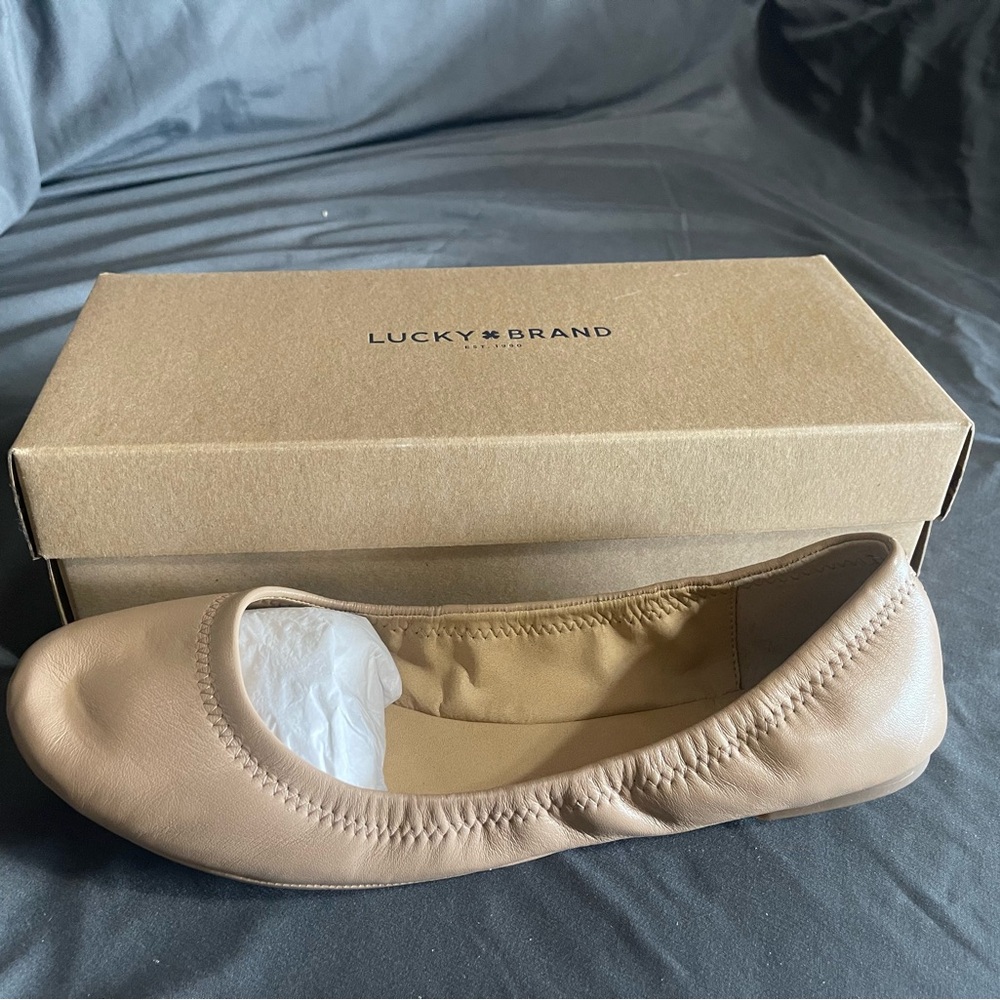Brand new, never worn black leather tan flats size 12 (runs small)